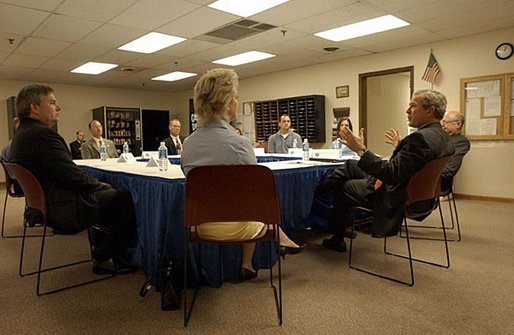 President George W. Bush meets with local business persons in Fridley, Minn., Thursday, June 19, 2003. White House photo by Tina Hager