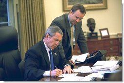  As pictured in the attached file photo, President George W. Bush works on a press statement with Principal Deputy White House Press Secretary Scott McClellan in the Oval Office Nov. 7, 2002. President Bush announced today that he will name Scott McClellan to be Assistant to the President and White House Press Secretary. Currently, Mr. McClellan is Deputy Assistant to the President and the Principal Deputy White House Press Secretary. He will succeed current White House Press Secretary Ari Fleischer, who has announced that he will depart the White House next month.  White House photo by Eric Draper