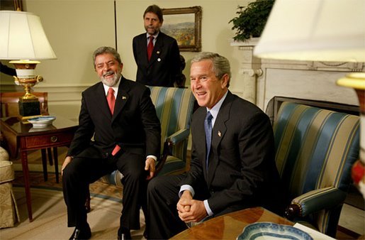 President George W. Bush and President Luiz Inacio Lula da Silva of Brazil address the media in the Oval Office Friday, June 20, 2003. "This is the third meeting I will have held with the President. It shows how important our relationship is," said President Bush. "Brazil is an incredibly important part of a peaceful and prosperous North and South America. I can say that from the perspective of the United States, this relationship is a vital and important and growing relationship." White House photo by Paul Morse