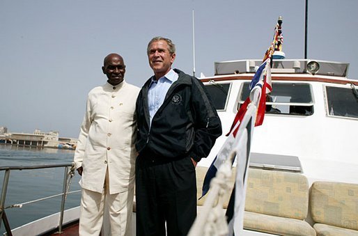 President George W. Bush and President Abdoulaye Wade of Senegal ride aboard the Presidential Yacht to Goree Island, Senegal, Tuesday, July 8, 2003. White House photo by Paul Morse.