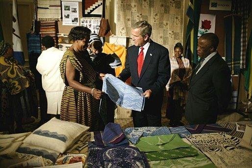 President George W. Bush participates in a tour of the Southern Africa Global Competitiveness Hub with President Festus Gontebanye Mogae of Botswana Thursday, July 10, 2003.