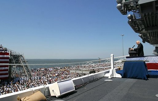 Vice President Dick Cheney speaks at the USS Ronald Reagan Commissioning Ceremony in Norfolk, Va., July 12, 2003. ”President Reagan spent eight years in the White House removing all doubts about the credibility of our forces, or about the clarity of America's purposes,” Vice President Cheney said.  “With complete courage and confidence, he asserted the right of all people and all nations to live in freedom. He believed that history is on the side of liberty, and that all tyrannies are doomed to failure.”  White House photo by David Bohrer.