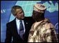 President George W. Bush with Nigerian President Olesugun Obasanjo after speaking at the Leon H. Sullivan Summit in Abuja, Nigeria on July 12, 2003. White House photo by Paul Morse.