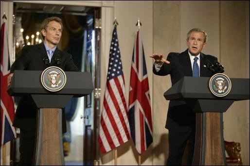 President George W. Bush speaks during a news conference with British Prime Minister Tony Blair in the Cross Hall of the White House, Thursday, July 17, 2003. White House photo by Paul Morse.