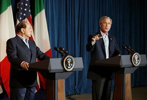 President George W. Bush welcomes Silvio Berlusconi, the Prime Minister of Italy, after his arrival at the Bush Ranch in Crawford, Texas, Sunday, July 20, 2003. White House photo by Paul Morse