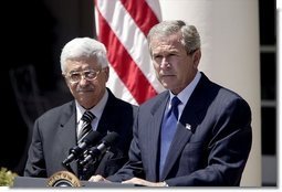 President George W. Bush and Palestinian Prime Minister Mahmoud Abbas hold a joint press conference in the Rose Garden Friday, July 25, 2003. "To break through old hatreds and barriers to peace, the Middle East needs leaders of vision and courage and a determination to serve the interest of their people. Mr. Abbas is the first Palestinian Prime Minister, and he is proving to be such a leader," said President Bush.  White House photo by Paul Morse