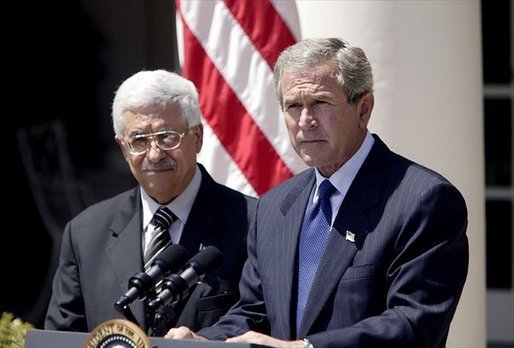 President George W. Bush and Palestinian Prime Minister Mahmoud Abbas hold a joint press conference in the Rose Garden Friday, July 25, 2003. "To break through old hatreds and barriers to peace, the Middle East needs leaders of vision and courage and a determination to serve the interest of their people. Mr. Abbas is the first Palestinian Prime Minister, and he is proving to be such a leader," said President Bush. White House photo by Paul Morse
