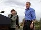 President George W. Bush is introduced by Secretary of Agriculture Ann Veneman before discussing his healthy forest initiative in Redmond, Ore., Thursday, August 21, 2003. Secretary of the interior Gale Norton is pictured in the background. White House photo by Paul Morse.