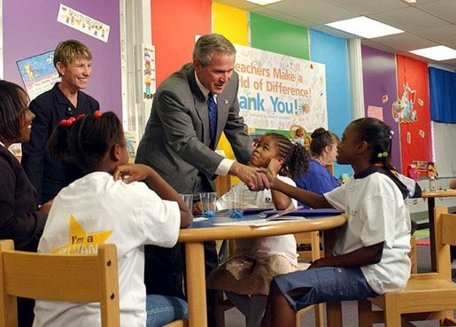 President George W. Bush visits with students from Kirkpatrick Elementary School in Nashville, Tenn., Monday, Sept. 8, 2003. White House photo by Tina Hager