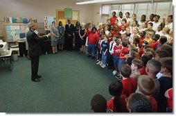 President George W. Bush is greeted by students at Hyde Park Elementary School in Jacksonville, Fla., Tuesday, Sept. 9, 2003.  White House photo by Tina Hager