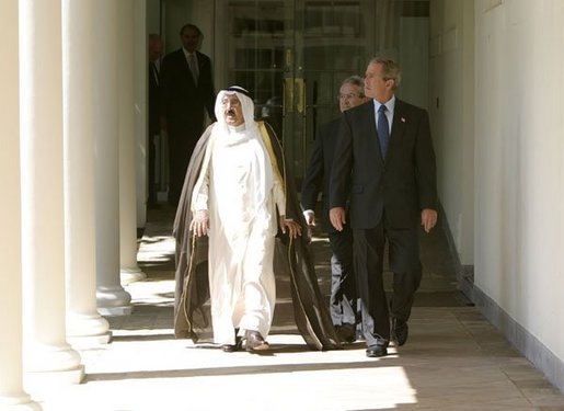 President George W. Bush and Prime Minister Sheikh Sabah al Ahmad al-Jabir Al Sabah of Kuwait walk along the colonnade after the two leaders met with reporters in the Oval Office Wednesday, Sept. 10, 2003. White House photo by Paul Morse.