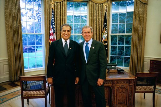President George W. Bush stands with Dr. Zalmay Khalilzad of Maryland, who he has nominated as Ambassador to Afghanistan in the Oval Office Monday, Sept. 22, 2003. Dr. Khalilzad currently serves as Special Presidential Envoy to Afghanistan, a role he will retain after he is confirmed as Ambassador. White House photo by Eric Draper.
