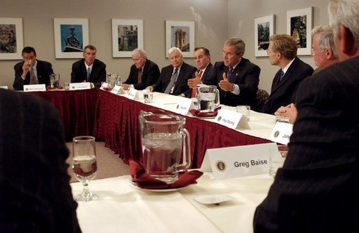 President George W. Bush discusses the economy with local business leaders in Chicago Tuesday, Sept. 30, 2003. "The thing I'm concerned about is people being able to find a job. We put the conditions in place for good job creation, but I recognize there's still people who want to work that can't find a job," said the President during his remarks after the meeting. "And we're dedicated to hearing the voices of those folks and working hard to expand our economy." White House photo by Tina Hager