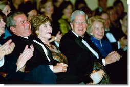 President George W. Bush and Laura Bush attend the 2003 National Book Festival Gala Performance and Dinner at the Library of Congress in Washington, D.C., Oct. 3, 2003.  White House photo by Susan Sterner