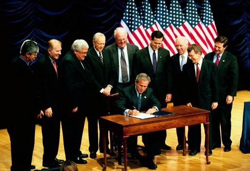 President George W. Bush signs S.3, the Partial Birth Abortion Ban Act of 2003., at the Ronald Reagan Building in Washington, D.C., Wednesday, Nov. 5, 2003. White House photo by Tina Hager.