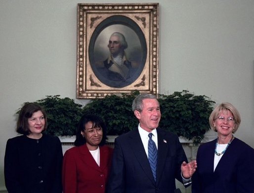 President George W. Bush introduces his judicial nominees Justice Priscilla Owen, left, Justice Janice Rogers Brown, center, and Judge Carolyn Kuhl in the Oval Office Thursday, Nov. 13, 2003. White House photo by Eric Draper