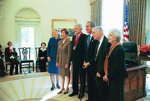 President George W. Bush and Laura Bush pose for a photo with actor Hal Holbrook, center, one of the National Humanities Medal Award recipients, during a ceremony in the Oval Office Friday, Nov. 14, 2003. White House photo by Susan Sterner.
