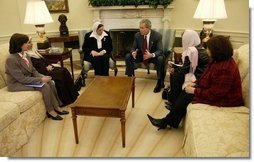 President George W. Bush meets with several Iraqi women leaders in the Oval Office Monday, November 17, 2003.  White House photo by Eric Draper