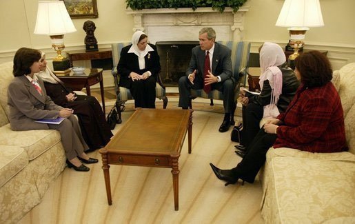 President George W. Bush meets with several Iraqi women leaders in the Oval Office Monday, November 17, 2003. White House photo by Eric Draper