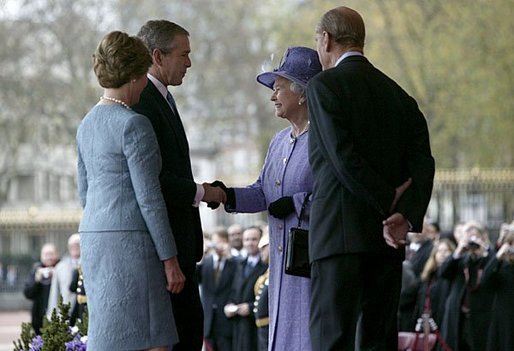 Arriving for the official ceremonial welcome for America's State Visit, President George W. Bush and Laura Bush are greeted by Her Majesty Queen Elizabeth and Prince Philip, Duke of Edinburgh, at Buckingham Palace in London Wednesday, Nov. 19, 2003. White House photo by Eric Draper.