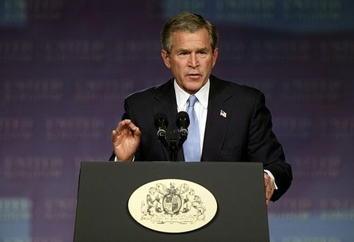 President George W. Bush speaks about Iraq and the war on terror at The Banqueting House in London Wednesday, Nov. 19, 2003. "We did not charge hundreds of miles into the heart of Iraq and pay a bitter cost of casualties, and liberate 25 million people, only to retreat before a band of thugs and assassins," said the President. "We will help the Iraqi people establish a peaceful and democratic country in the heart of the Middle East. And by doing so, we will defend our people from danger." White House photo by Paul Morse.