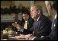 President George W. Bush speaks to reporters at the end of his Cabinet Meeting, Thursday, Dec. 11, 2003.  White House photo by Eric Draper