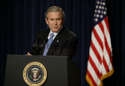President George W. Bush holds a press conference in the Dwight D. Eisenhower Executive Office Building Monday, Dec. 15, 2003. White House photo by Paul Morse