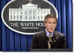 President George W. Bush makes a statement to the press on Libya agreeing to dismantle its weapons of mass destruction program on Friday December 19, 2003.  White House photo by Paul Morse