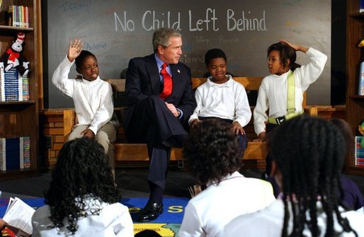 President George W. Bush greets fourth graders at the Pierre Laclede Elementary School in St. Louis, Mo., Monday Jan. 5, 2004. White House photo by Tina Hager