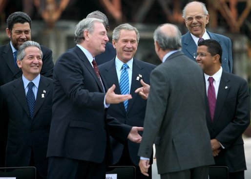 President George W. Bush shares a laugh with world leaders during the official family photo the Special Summit of the Americas in Monterrey, Mexico, Tuesday, Jan. 13, 2004. White House photo by Eric Draper