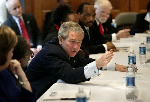President George W. Bush holds a roundtable conversation about the positive effects that faith-based initiatives have had on local people at Union Bethel African Methodist Episcopal Church in New Orleans, La., Thursday, Jan. 15, 2004. "We just had a lot of people from the community, people who have been helped, people who are helping, neighborhood healers here to share their stories," said the President about the discussion in his remarks. White House photo by Eric Draper