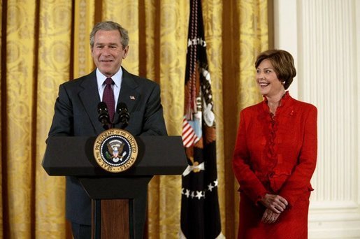 President George W. Bush and Laura Bush talk about heart disease as the number-one killer of all Americans during White House ceremonies to launch American Heart Month Monday, Feb. 2, 2004. The event, part of the national Heart Truth campaign, was held to highlight the issue of heart disease and women. White House photo by Susan Sterner