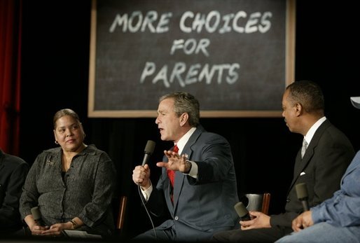President George W. Bush talks about parental options and school choice at Archbishop Carroll High School in Washington, D.C., Friday, Feb. 13, 2004. White House photo by Paul Morse