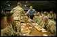 President George W. Bush greets national guardsmen as he joins them for lunch at Fort Polk, La., Tuesday, Feb. 17, 2004. White House photo by Paul Morse.