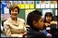 Laura Bush participates in a reading lab with third and fourth graders at Limerick Elementary school in Los Angeles, California, Wednesday, February 18, 2004. "We know that if children don't learn to read by the end of the 3rd grade or 4th grade, their chances for learning to read decrease every year, and by the time they get to high school they're often the ones who drop out because of frustration that they -- over not being able to read," said Mrs. Bush during her visit to Limerick Elementary. White House photo by Tina Hager