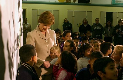 Laura Bush is greeted by students at Limerick Elementary School in Los Angeles, California, Wednesday, February 18, 2004. White House photo by Tina Hager