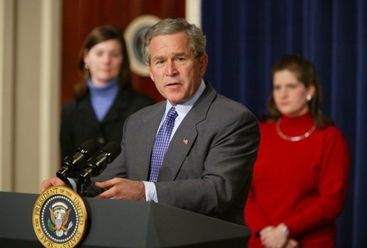 President George W. Bush gives remarks on the economy with members of tax families present in room 450 of the Eisenhower Executive Office Building on February 19, 2004. White House photo by Paul Morse