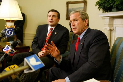 President George W. Bush answers questions from the press after meeting with the president of Georgia Mikhail Saakashvili in the Oval Office on February 25, 2004. White House photo by Paul Morse.