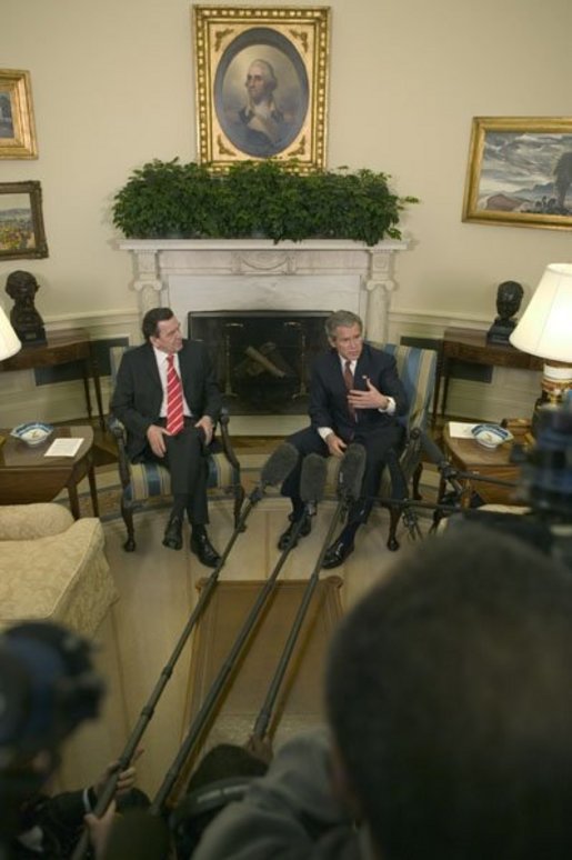President George W. Bush and German Chancellor Gerhard Schroeder hold a joint press conference in the Oval Office Friday, Feb. 27, 2004. White House photo by Eric Draper