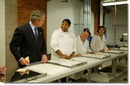  Attending the Women's Entrepreneurship in the 21st Century Forum, President George W. Bush tours Thermagon, Inc., in Cleveland, Ohio, Wednesday, March 10, 2004. The company was founded by entrepeneur Carol Latham in 1992.  White House photo by Paul Morse