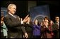 President George W. Bush reacts to the applause of the crowd before speaking at the Women's Entrepreneurship in the 21st Century Forum in Cleveland, Ohio, Wednesday, March 10, 2004. White House photo by Paul Morse.