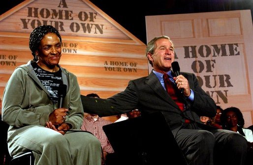 President George W. Bush speaks during a discussion about homeownership with first-time homebuyer Pearl Cerdan in Ardmore, Pennsylvania. Monday, March 15, 2004. White House photo by Tina Hager