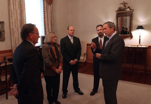 President George W. Bush talks with participants in the President's conversation about health access at the U.S. Chamber of Commerce Tuesday, March 16, 2004. White House photo by Tina Hager