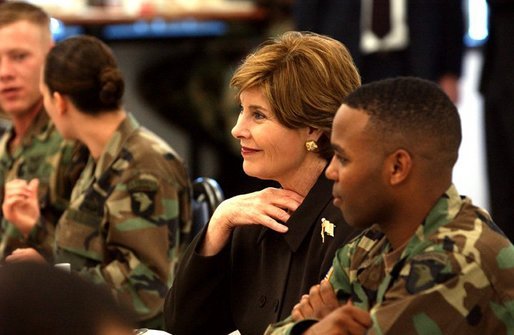 President George W. Bush and Laura Bush have lunch with soldiers in Fort Campbell, Kentucky. Thursday, March 18, 2004. White House photo by Tina Hager.