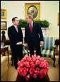 President George W. Bush meets with Colombian President Alvaro Uribe in the Oval Office Tuesday, March 23, 2004. White House photo by Eric Draper.