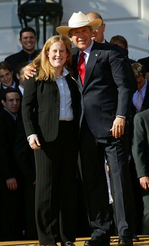 President George W. Bush greets Jordan Walker of University of North Carolina's women's soccer team during a visit by the 2003 Fall NCAA Championship teams on the South Lawn March 23, 2004. In attendance were the University of Southern California's football and women's volleyball teams, the University of North Carolina women's soccer team, Louisiana State University football team and Indiana University men's soccer team. White House photo by Eric Draper.