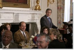 President George W. Bush addresses members of the Baseball Hall of Fame in the State Dining Room of the White House Wednesday, March 31, 2004.  White House photo by Paul Morse