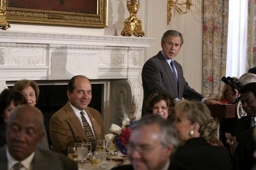 President George W. Bush addresses members of the Baseball Hall of Fame in the State Dining Room of the White House Wednesday, March 31, 2004. White House photo by Paul Morse