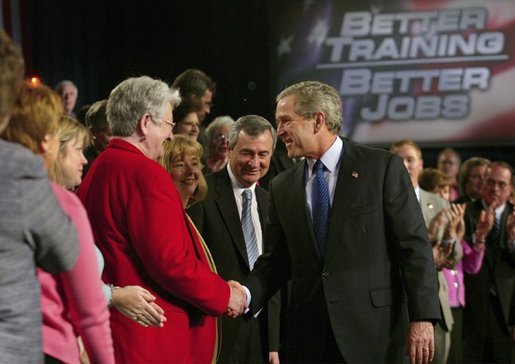 President George W. Bush greets the audience after his remarks on job training and the economy at Central Piedmont Community College in Charlotte, N.C., Monday, April 5, 2004. White House photo by Eric Draper
