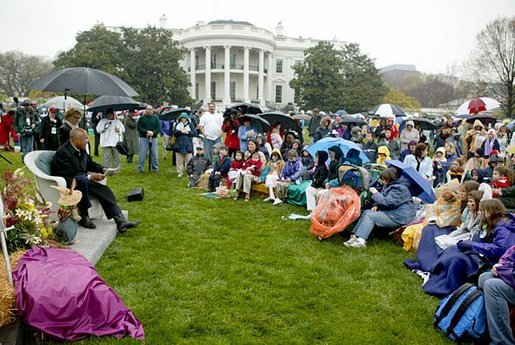 Secretary of Education Rod Paige reads a storybook during the 2004 White House Easter Egg Roll Monday, April 12, 2004. White House photo by Paul Morse.